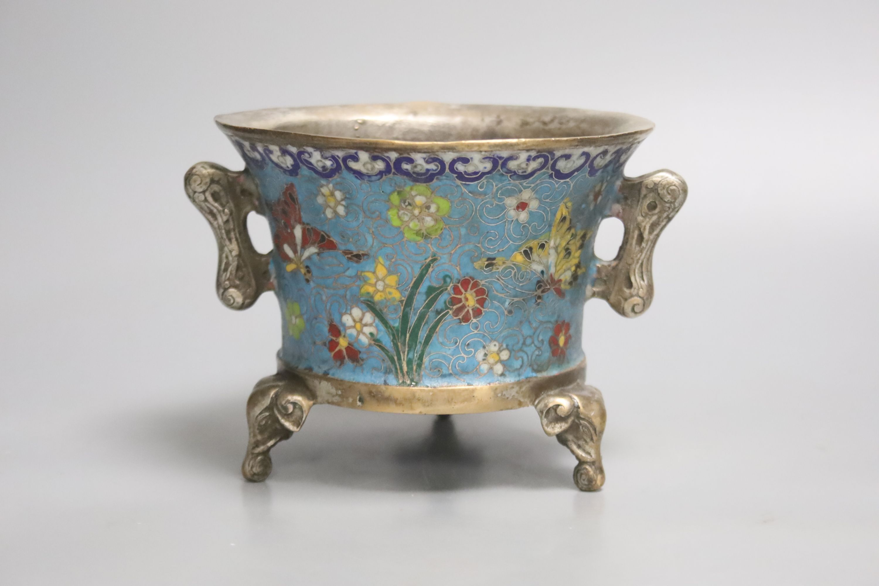 A heavy Chinese silvered bronze twin handled censer with floral decoration, a four character Xuande mark, diameter 14cm 12cm high